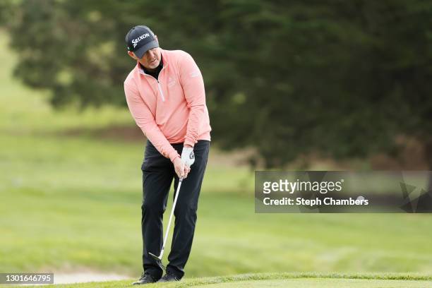 Rod Pampling of Australia plays a shot on the first hole during the first round of the AT&T Pebble Beach Pro-Am at Spyglass Hill Golf Course on...