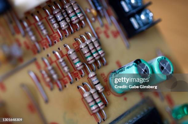 close up on a circuit board - capacitor stock pictures, royalty-free photos & images