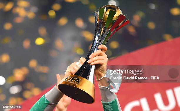 Detailed view of the FIFA Club World Cup Qatar 2020 trophy lifted by Manuel Neuer of FC Bayern Muenchen as FC Bayern Muenchen celebrate after winning...