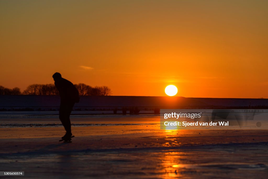 People Ice Skating in The Netherlands