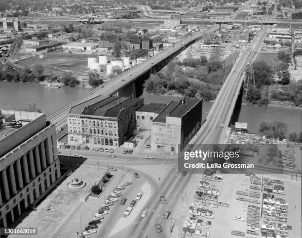 An aerial view of the Woodland Street and Shelby Street bridges that cross over the Cumberland River 1974 in downtown Nashville, Tennessee.