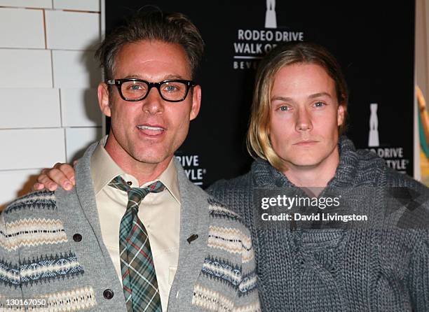 Personalities Jeffrey Alan Marks and Ross Cassidy attend the Rodeo Drive Walk of Style Award event honoring Iman and Missoni on October 23, 2011 in...