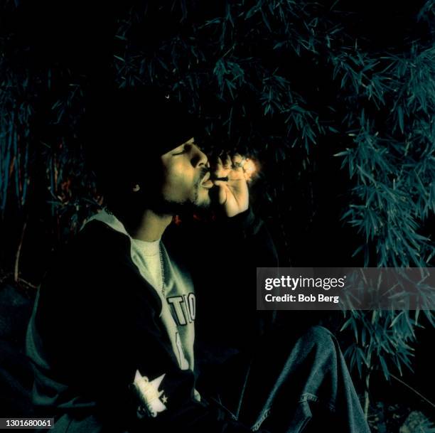 American rapper, singer, songwriter, actor, record producer, and entrepreneur T.I. Smokes his joint during a portrait session circa 1999 in Los...