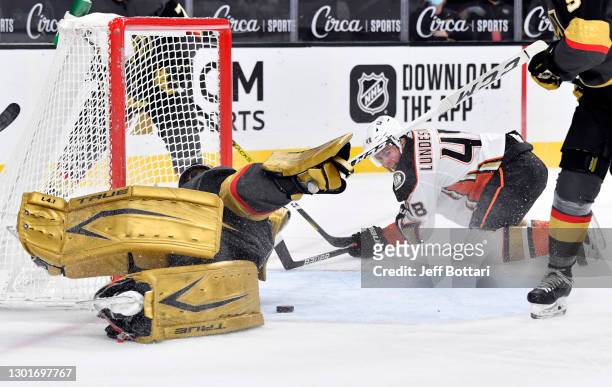 Marc-Andre Fleury of the Vegas Golden Knights makes a diving save against Isac Lundestrom of the Anaheim Ducks during the second period at T-Mobile...