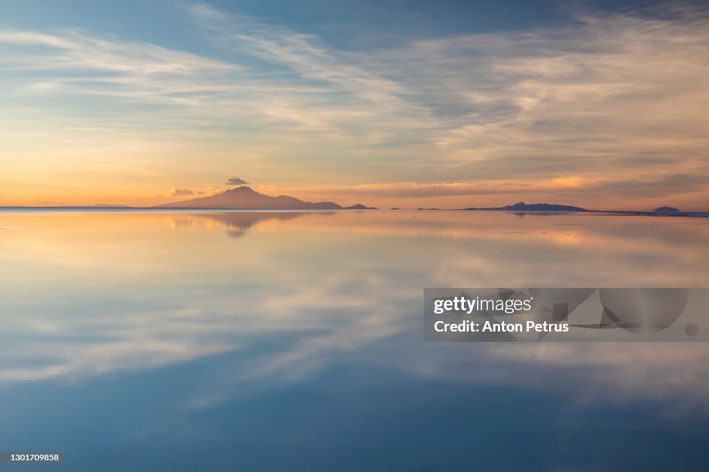 Sunset at Salar de Uyuni in the rainy season, Aitiplano, Bolivia