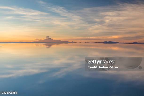 sunset at salar de uyuni in the rainy season, aitiplano, bolivia - anton petrus panorama of beautiful sunrise bildbanksfoton och bilder