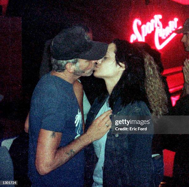 Newly married Billy Bob Thornton and Angelina Jolie kiss at Jerry''s Famous Deli June 3, 2000 in Studio City, CA.