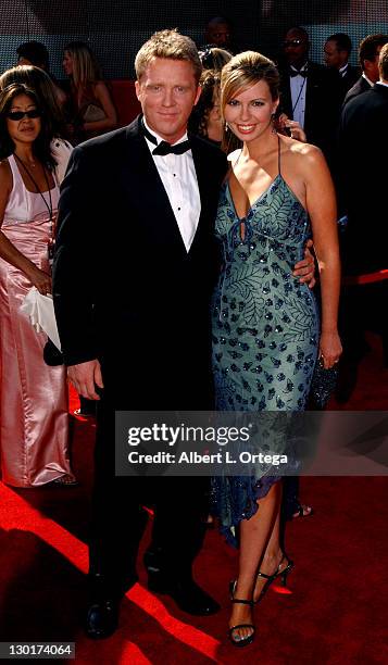 Anthony Michael Hall and guest during The 55th Annual Primetime Emmy Awards - Arrivals at The Shrine Theater in Los Angeles, California, United...