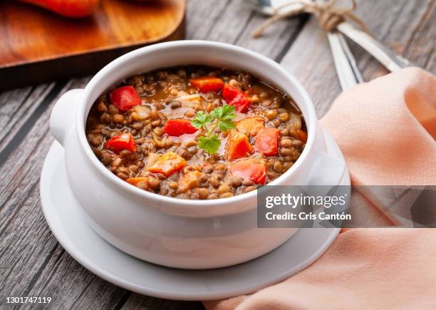 lentils soup with vegetables - eintopf stock-fotos und bilder