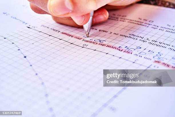 homework - children looking graph stock pictures, royalty-free photos & images