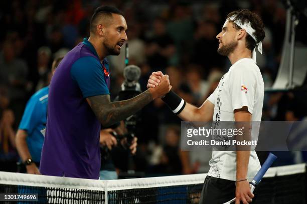 Dominic Thiem of Austria shakes hands with Nick Kyrgios of Australia after their Men's Singles third round match during day five of the 2021...