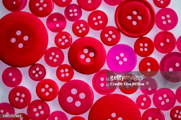 patterns of buttons in many colors - bottone articoli di merceria foto e immagini stock