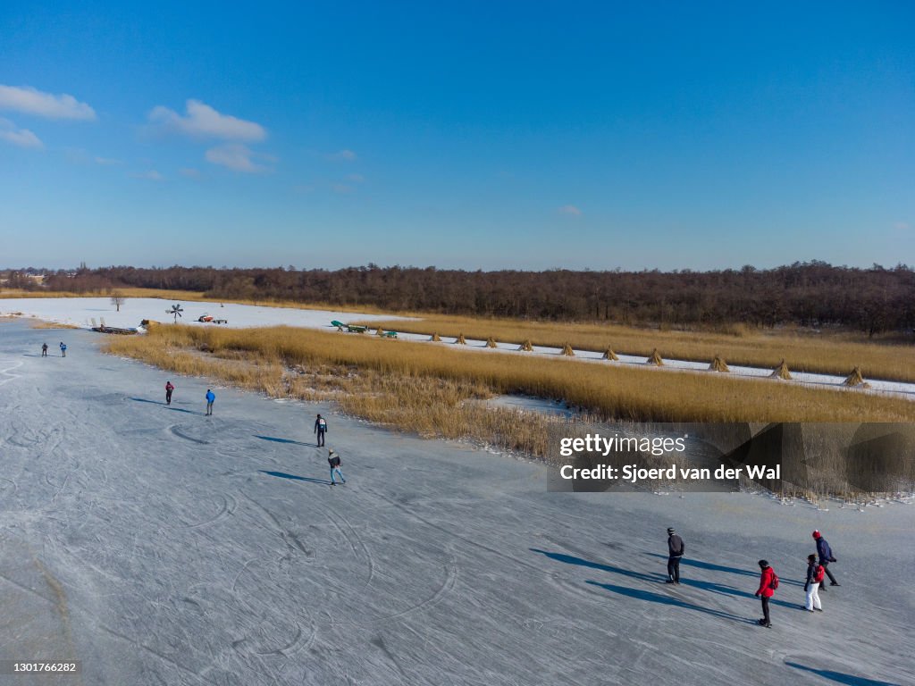 People Ice Skating in The Netherlands
