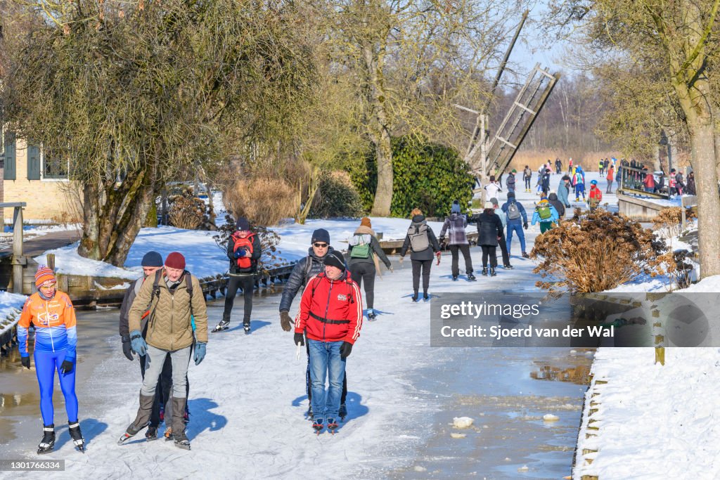 People Ice Skating in The Netherlands