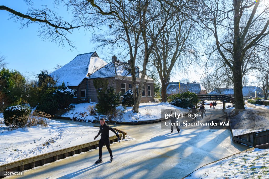 People Ice Skating in The Netherlands