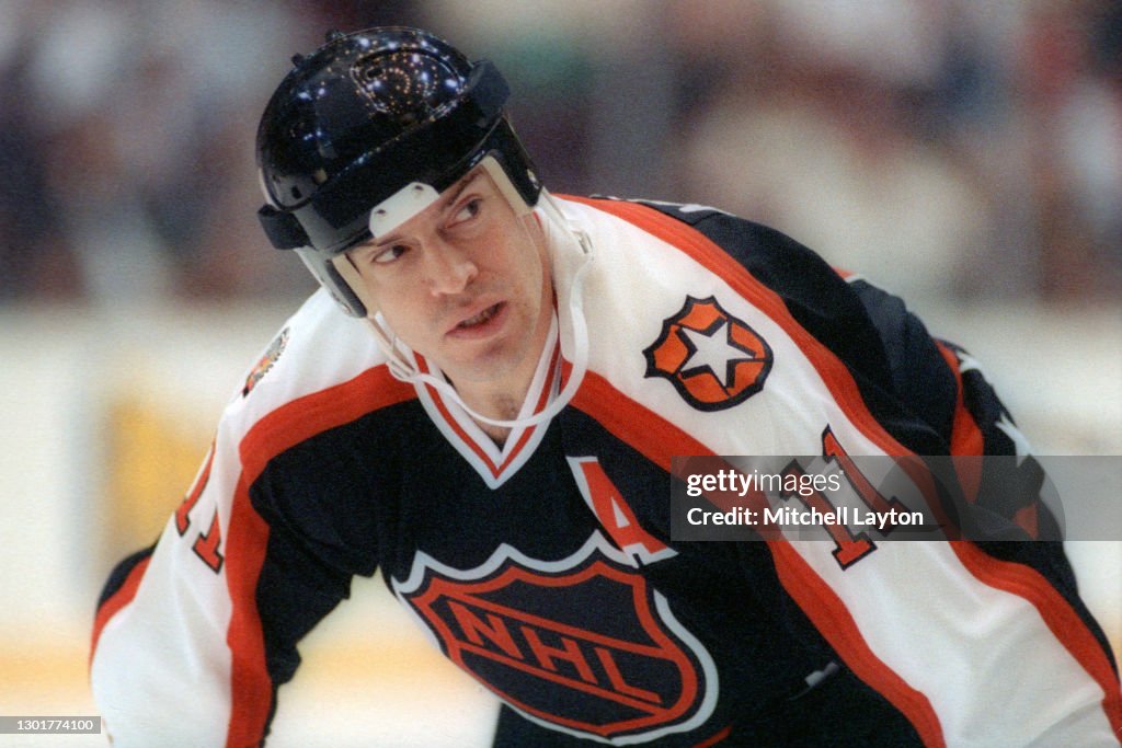 Alex Messier Mark Messier of the Campbell Conference and the Edmonton Oilers looks ...