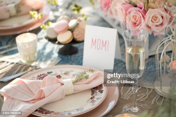 elegant mother's day dining table - roses and champagne stock pictures, royalty-free photos & images