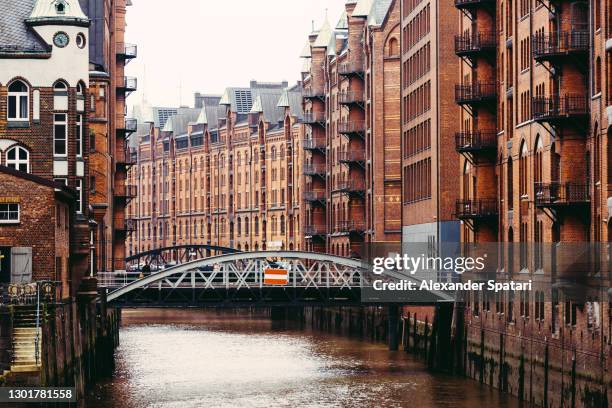 speicherstadt district in hamburg, germany - speicherstadt stockfoto's en -beelden