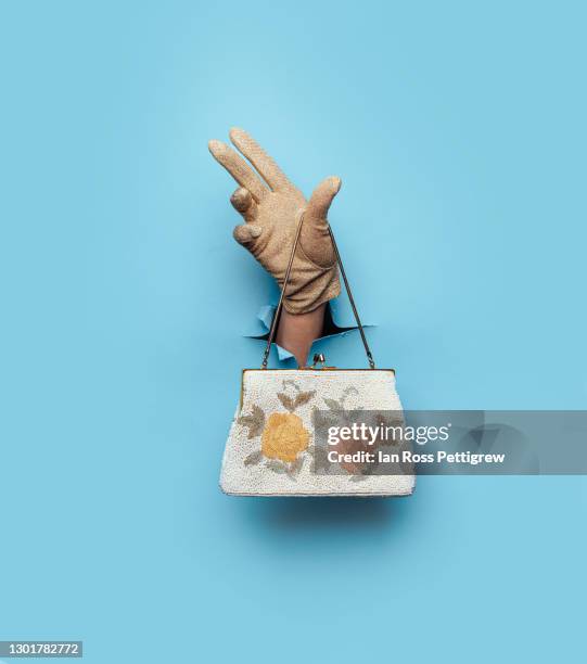 woman's gloved hand holding purse - vintage handbag stock pictures, royalty-free photos & images