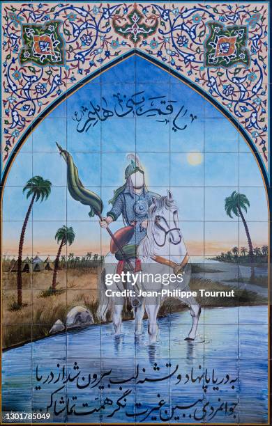 mural painting reffering to imam hussein martyrdom and the battle of karbala, damghan, iran - muharram fotografías e imágenes de stock