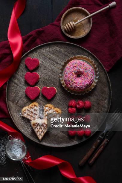 love breakfast plate for valentines with waffles and sweets - sweetie pie stock pictures, royalty-free photos & images