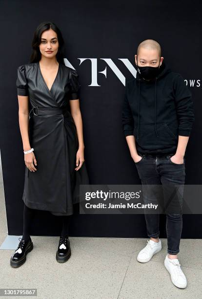 Model Gizele Oliveira and designer Jason Wu pose at the Jason Wu Masterclass during February 2021 - New York Fashion Week: The Shows at Spring...