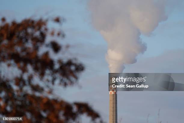Exhaust emerges from the smokestack of a natural-gas fired power plant in the city center on February 10, 2021 in Berlin, Germany. Germany is seeking...