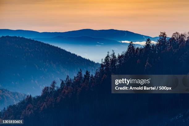 scenic view of silhouette of mountains against sky at sunset,thal,graz,austria - thal austria stock pictures, royalty-free photos & images