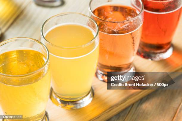 close-up of drinks on table - sidra fotografías e imágenes de stock