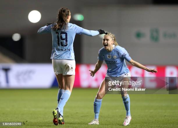 Caroline Weir of Manchester City celebrates scoring her sides third goal with Steph Houghton of Manchester City during the Barclays FA Women's Super...