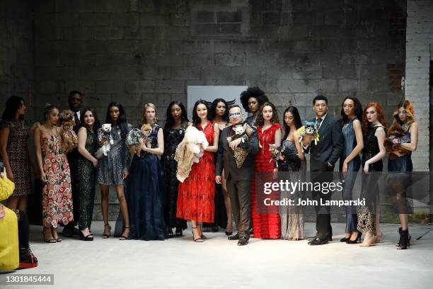 Designer Anthony Rubio and models pose with dogs during Anthony Rubio's Women's Wear Canine Couture show during New York Fashion Week at Ideal Glass...