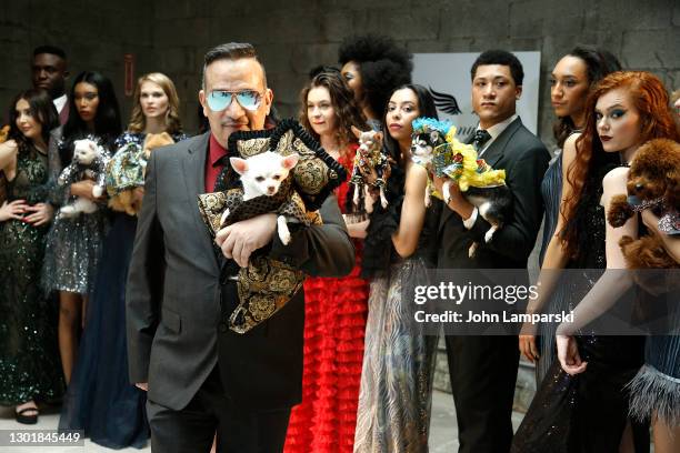 Designer Anthony Rubio and models pose with dogs during Anthony Rubio's Women's Wear Canine Couture show during New York Fashion Week at Ideal Glass...
