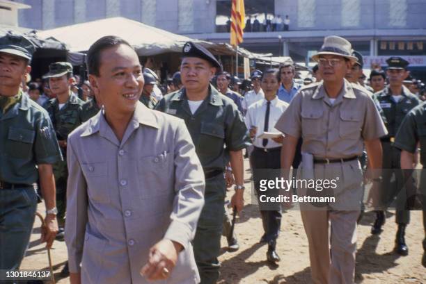 President of South Vietnam Nguyen Van Thieu and officials ahead of a mass funeral for the victims of the 1968 Tet Offensive, killed by the Viet Cong,...