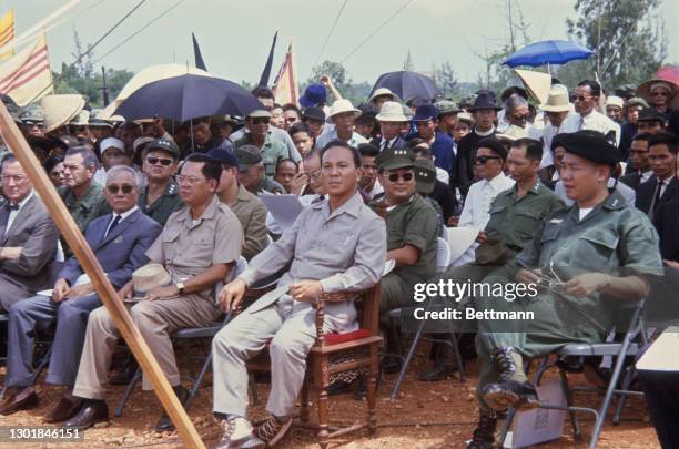 President of South Vietnam Nguyen Van Thieu and officials attending a mass funeral for the victims of the 1968 Tet Offensive, killed by the Viet...