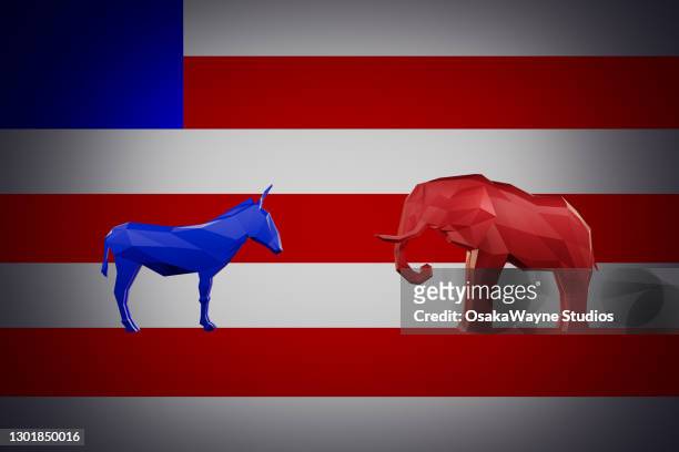 democrat donkey standing against republican elephant on american flag - presidential candidate stock pictures, royalty-free photos & images