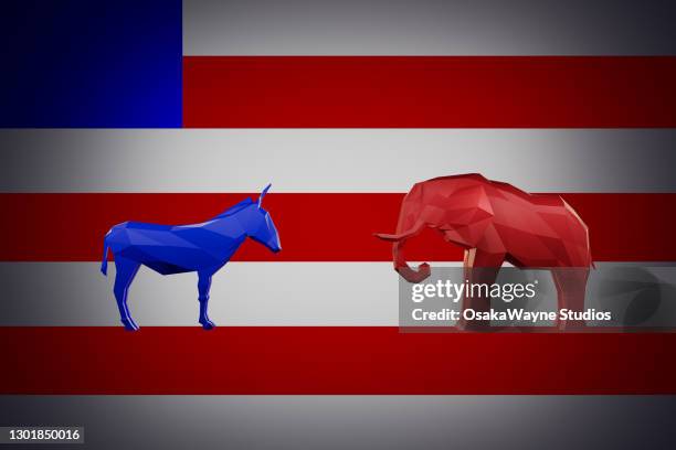 democrat donkey standing against republican elephant on american flag - republican party 個照片及圖片檔