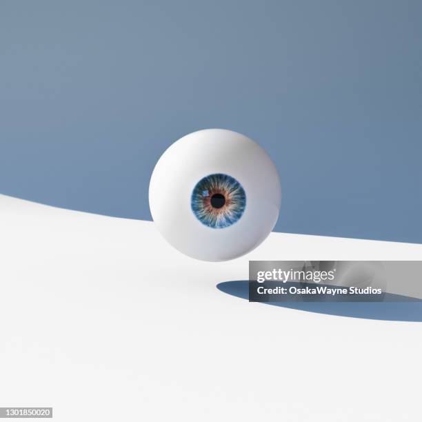 eyeball bouncing on white surface - 3d model stock pictures, royalty-free photos & images