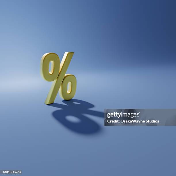 yellow percent sign on blue background - percentage sign stock pictures, royalty-free photos & images