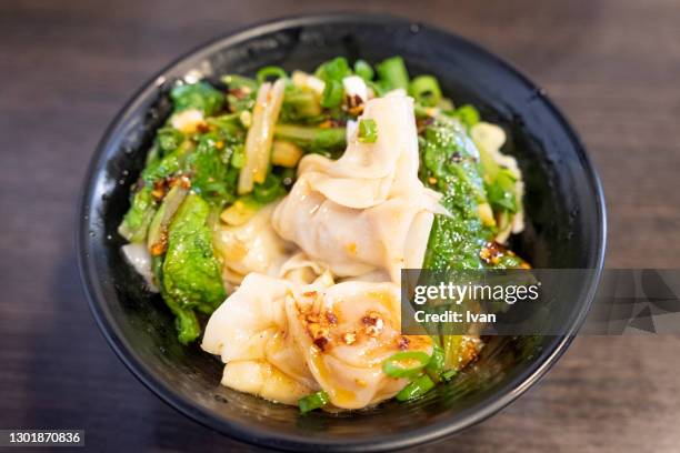 traditional chinese cuisine, meat dumpling in chili oil - noodle soup stock pictures, royalty-free photos & images