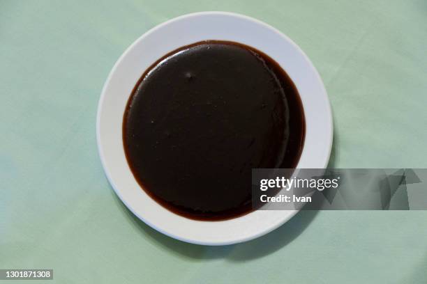 traditional asian food, a plate of soy bean sauce in a circle - soy sauce stock pictures, royalty-free photos & images