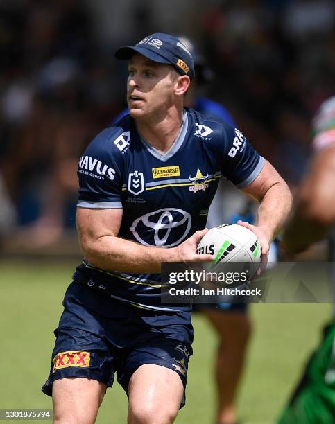 Michael Morgan of the Cowboys runs the ball during the North Queensland Cowboys Scrimmage game against the Townsville Blackhawks at Rugby Park on...