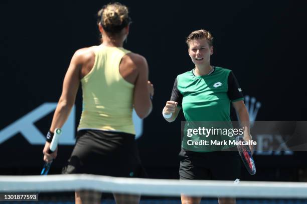 Nicole Melichar of the United States and Demi Schuurs of the Netherlands celebrate match point in their Women's Doubles second round match against...