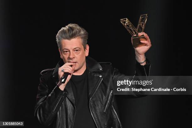 Benjamin Biolay receives the ‘best album of the year’ award during the 36th "Victoires De La Musique" Award Ceremony at La Seine Musicale on February...