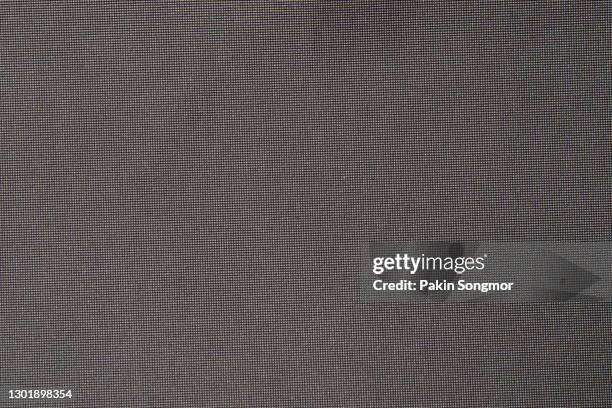 black fabric cloth polyester texture, textile background. - carbon fibre texture stock pictures, royalty-free photos & images