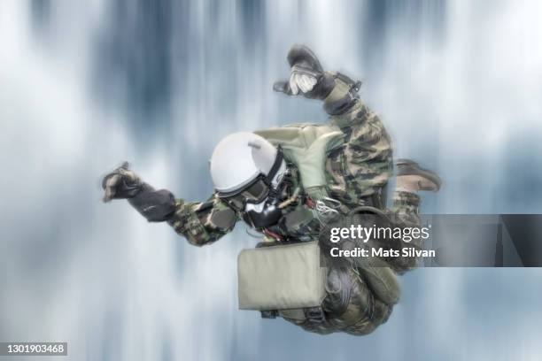 military skydiver in free fall - skydive close up stock pictures, royalty-free photos & images