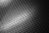Shiny black dotted rubber carpet relief