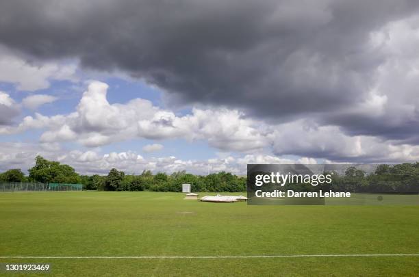 rain stopped play - cricket pitch - cricket pitch stock pictures, royalty-free photos & images