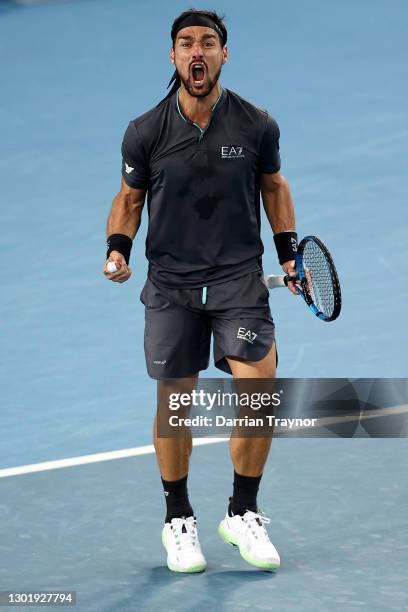 Fabio Fognini of Italy celebrates match point in his Men's Singles third round match against Alex De Minaur of Australia during day six of the 2021...