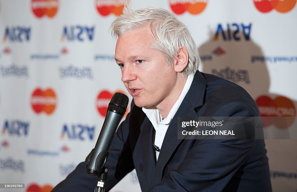 Wikileaks founder Julian Assange stands