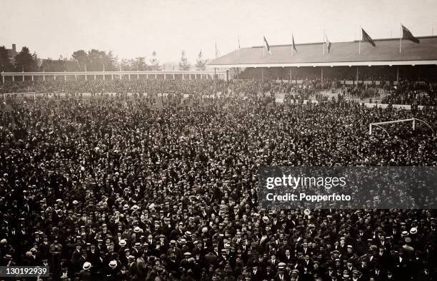 The scene on the pitch at the Olympic Stadium following the abandonment of the football final between Belgium and Czechoslovakia during the Olympic...